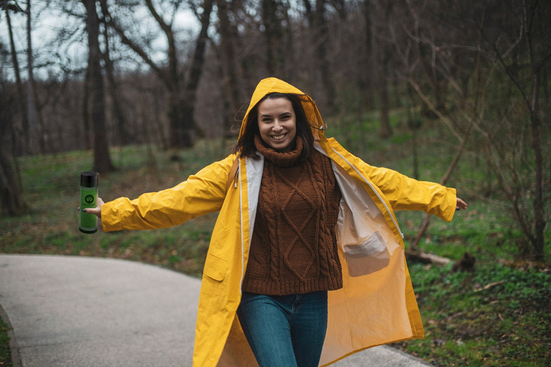 Happy Women Dancing in the Rain with her Yellow Raincoat and travel DōMatcha Shaker